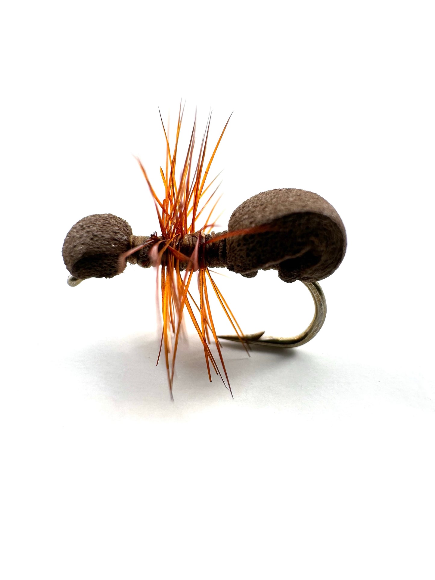 Premium brown ant dry fly for fly fishing, expertly designed to mimic natural ants, perfect for targeting trout in freshwater rivers and streams. High-quality, durable materials ensure lifelike presentation and floatability, ideal for dry fly fishing enthusiasts.