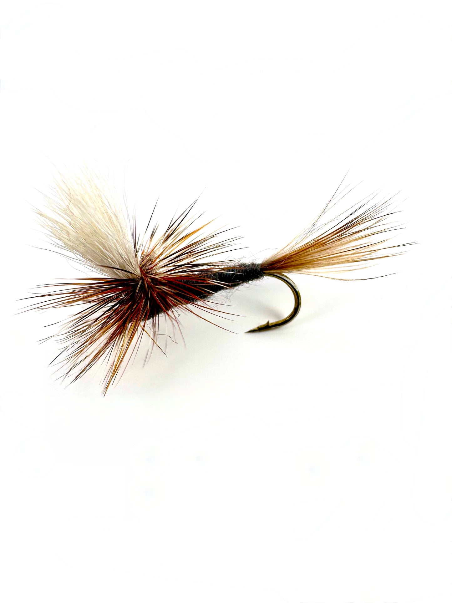 Hand-tied parachute Adams dry fly for fly fishing, perfect for targeting trout in freshwater rivers and streams. Features a parachute hackle for superior floatability and visibility, ideal for dry fly anglers seeking a versatile, high-quality fly to mimic various insects.