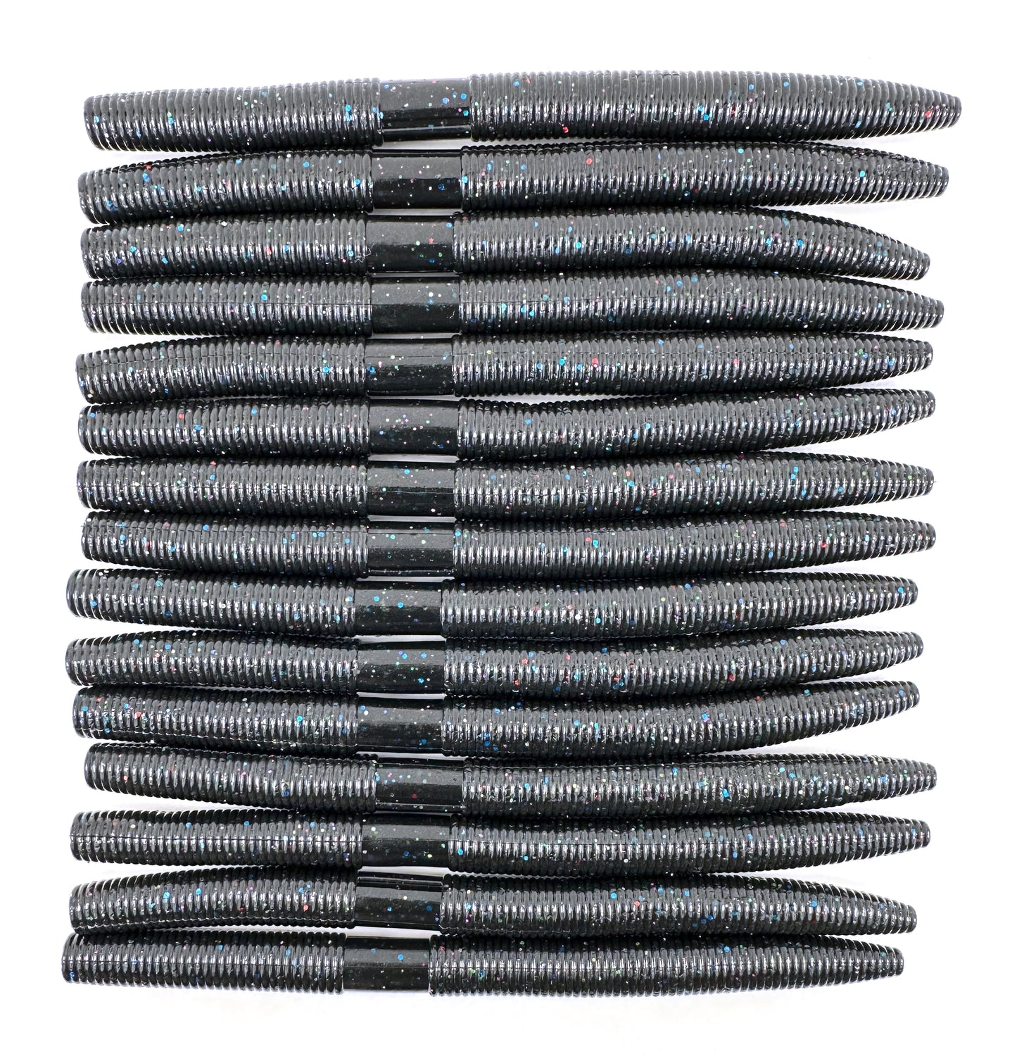 Black multi flake pattern 15 pack Senkos for bass fishing, soft plastic stick baits designed for targeting largemouth and smallmouth bass. Durable and versatile, perfect for wacky rig, Texas rig, or weightless presentations. Natural brown cinnamon color mimics real baitfish and worms, ideal for bass in lakes and rivers. High-quality senko baits for effective bass fishing.