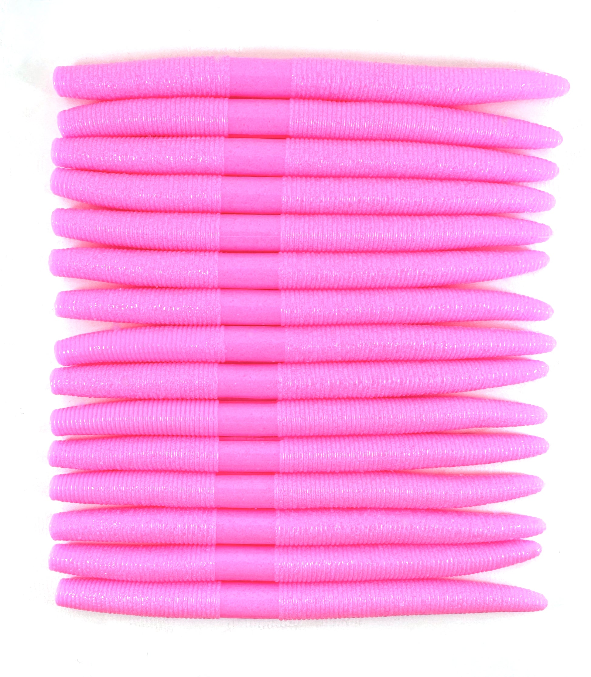 Bubblegum pink pattern 15 pack Senkos for bass fishing, soft plastic stick baits designed for targeting largemouth and smallmouth bass. Durable and versatile, perfect for wacky rig, Texas rig, or weightless presentations. Natural brown cinnamon color mimics real baitfish and worms, ideal for bass in lakes and rivers. High-quality senko baits for effective bass fishing.