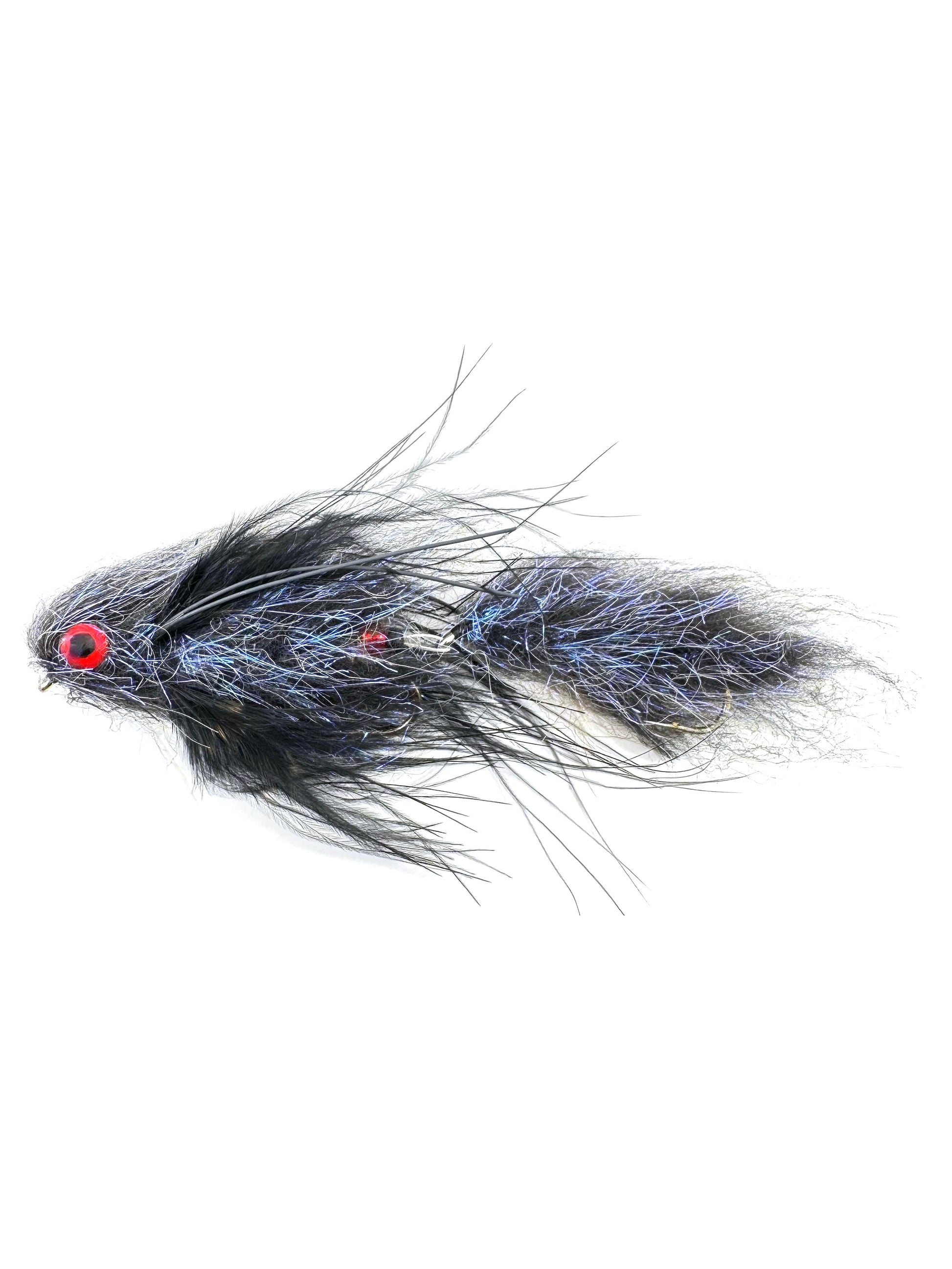 Articulated Cheech Leech Streamer fly fishing lure for targeting large trout, bass, and pike. Featuring a two-part articulated design for lifelike movement in the water, this streamer mimics a leech or baitfish, attracting predatory fish. Hand-tied with durable materials, perfect for fly fishing in lakes and rivers. High-quality Cheech Leech Streamer for aggressive strikes and effective presentations.